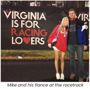 Mike and his fiance at the racetrack