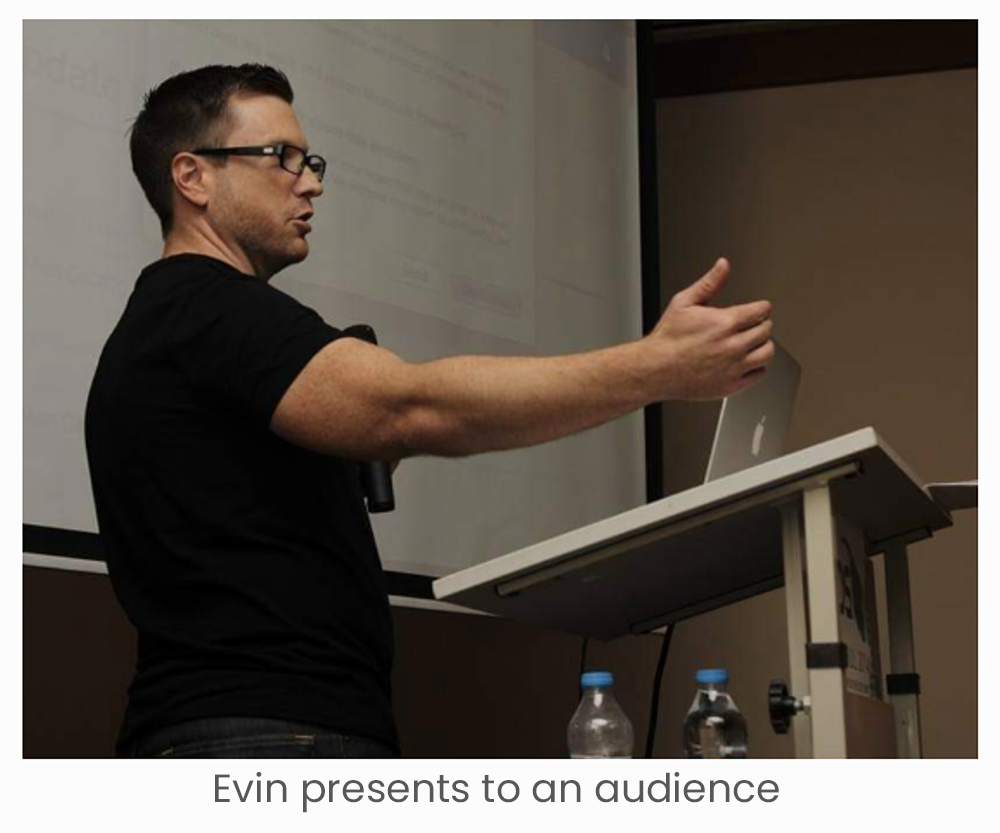 Evin speaking to an audience
