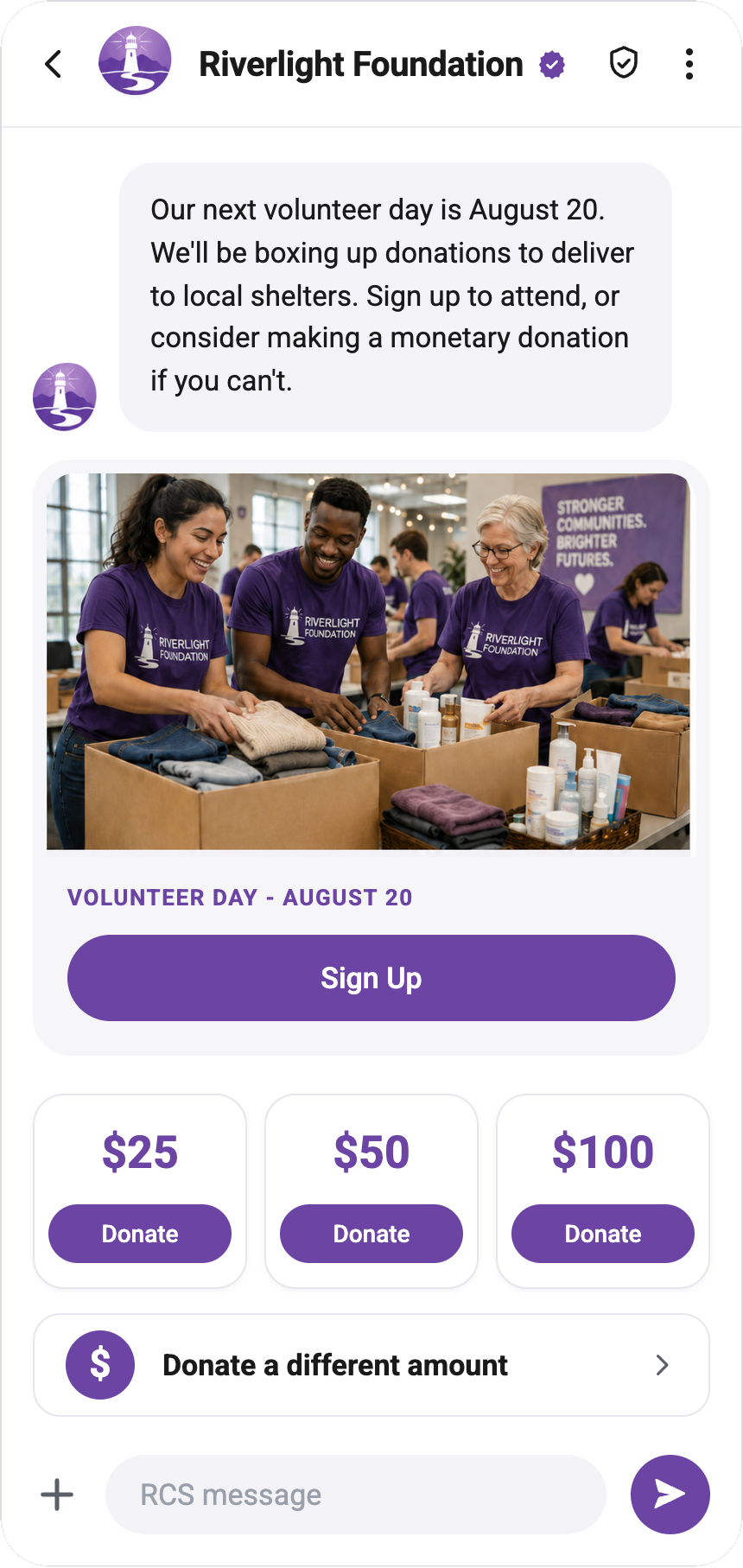 Riverlight Foundation RCS message announcing an August 20 volunteer day boxing up clothing and personal care donations for local shelters, with a photo of volunteers, a Sign Up action, plus View Event Details and Make a Donation quick replies